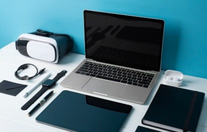 Laptop, tablet and accessories on a desk
