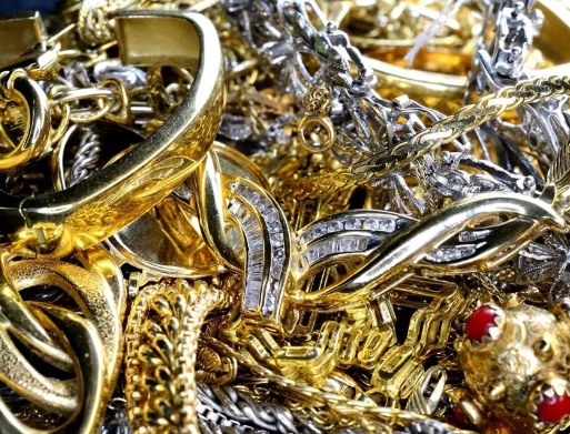 A pile of gold and silver jewelry